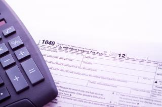 calculator on top of irs form