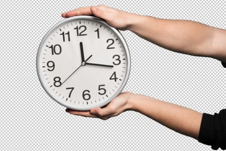 hands holding a clock