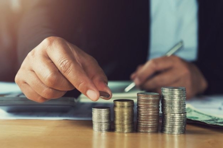 man counting coins