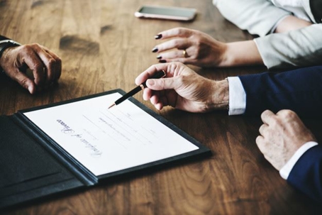 people reviewing contract